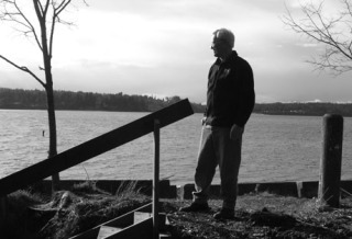 Road Ends Committee member Vince Larson inspects recent work Fletcher Landing.