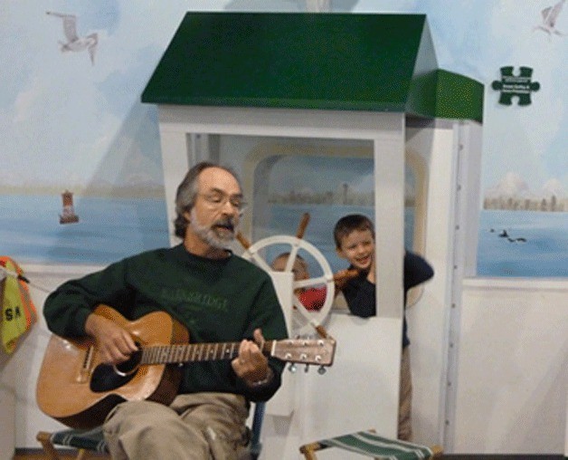 David Webb leads another fun session of Tuesday Tunes at Kids Discovery Museum.