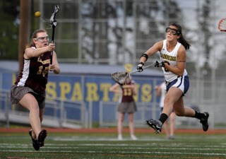 Bainbridge High lacrosse player Mariah Walk fires a shot for goal against Lakeside Wednesday. Walk was weakened by a flu bug