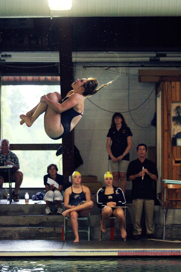 Cammie Rouser competes in diving during the Spartans’ first swim meet. She took first with a score of 196.25.