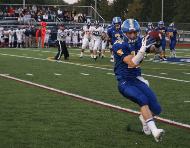 Senior Alex Coplan catches the ball for a first down shortly before the Spartans scored their first touchdown of the game.