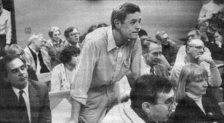 Former City Council member Andy Maron (standing) at a 1991 meeting to discuss the annexation of Bainbridge Island.