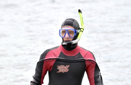 Swimmer Mark Powell is nearing his final paces during a swim along the south end of Bainbridge Island. Powell will be completing his 40 mile swim around the island on Saturday morning. The swim is the culmination of 38 legs that started last October.