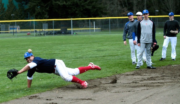 BHS baseball player Tino Peleti dives for a catch during a practice session earlier this week.