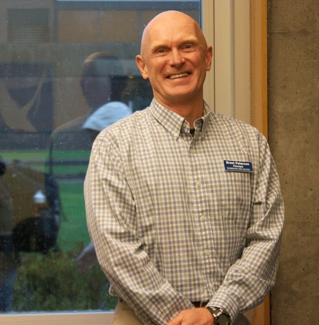 Principal Brent Peterson stands in his office at Bainbridge High School.