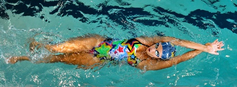 BHS Sophomore Cameo Hlebasko backstrokes her way down the pool during practice. She is one of four sophomores on the team this season.