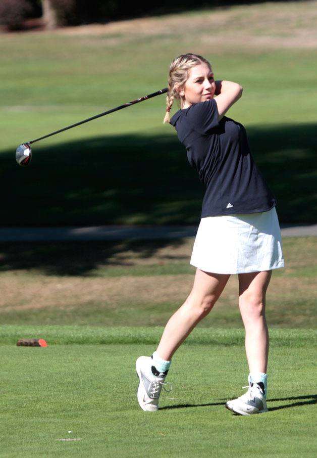 BHS senior golfer Nicole Daniels tees off at the second hole of last week’s home match against Eastside Catholic.