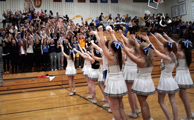 The Bainbridge High cheerleading squad rallies the crowd at a recent basketball game.