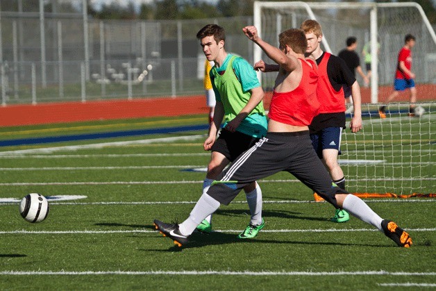 The Bainbridge High School varsity boys soccer team take advantage of the nice weather during practice last week. Their first test of the season will come at 6 p.m. Friday