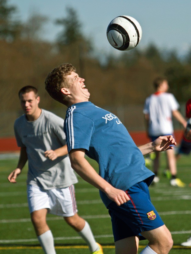 BHS senior soccer player Tanner Salmon practices using his chest to keep control of a high-flying ball Wednesday