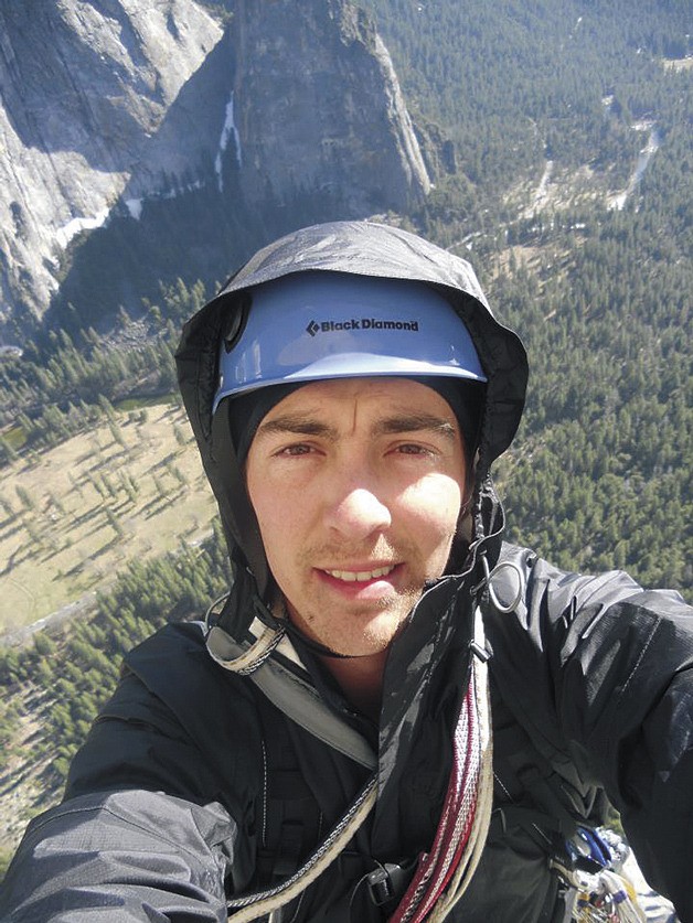 Jason Lawson hangs off the side of El Capitan in Yosemite Valley during a climbing outing. Lawson