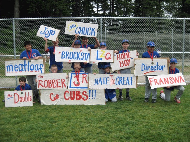 Signs and sportsmanship abounded as the Bainbridge Island Little League season came to a close the Cubs won the Majors championship.