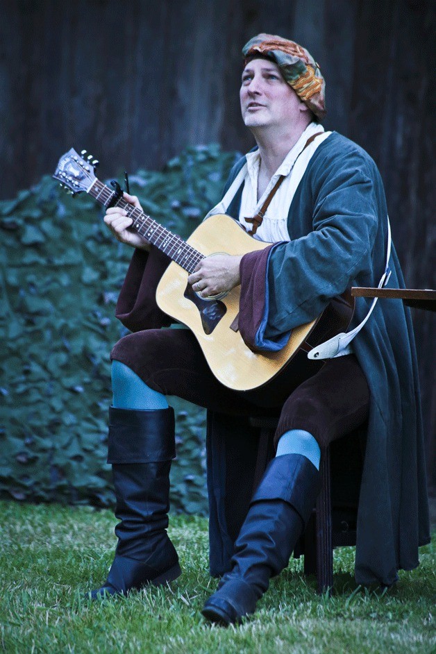 Joel Underwood as Feste the clown in the BPA Shakespeare Society's 'Twelfe Night or What You Will' at the Bloedel Reserve.