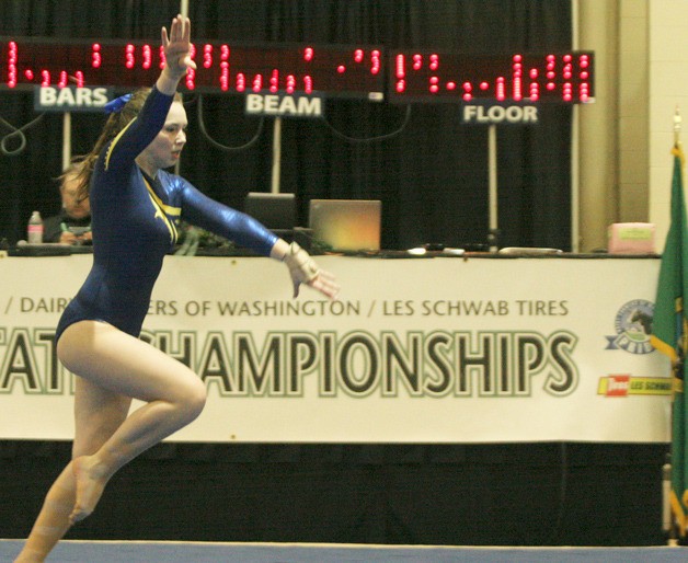 Miller Shor of Bainbridge Island competes in the floor exercise competition at the state gymnastics meet.