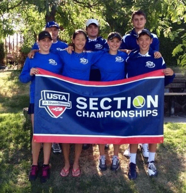 Members of the Kitsap Tennis and Athletic Club gather for a photo. In the front row is Olivia Anderson