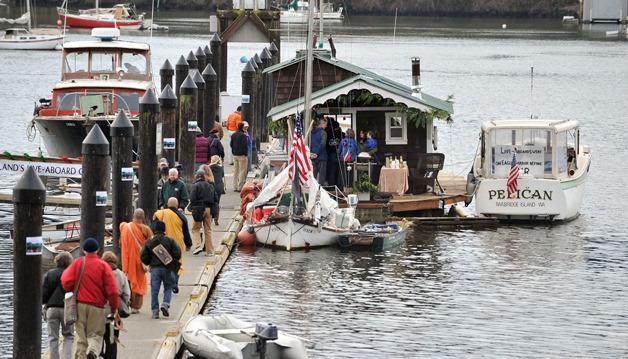 Community members and liveaboards gathered Wednesday at the city dock in Eagle Harbor for a liveaboard support rally. Inside the historic Wicca houseboat