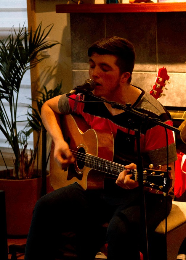 Eagle Harbor High School junior Morgan Leader performs his original song “To Call My Own” from his debut album “We Are The Waiting