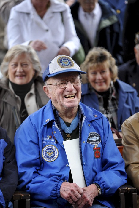 John 'Bud' Hawk enjoys a speaker's comments during Friday's dedication ceremony at the Rolling Bay Post Office The building was officially named after the Bainbridge Island native.