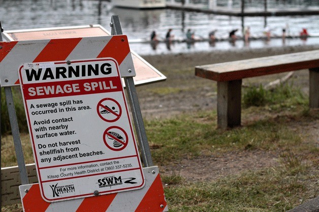 Eagle Harbor has been posted with sewage spill warning signs after this week's spill of untreated wastewater into the harbor.