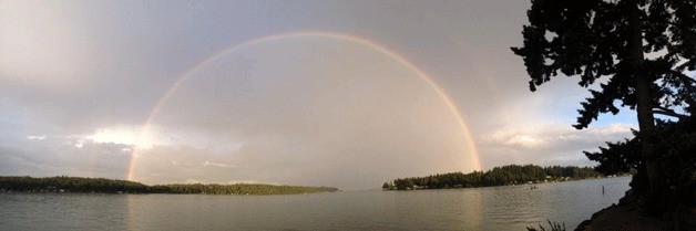 Islander John Ellis captured this image of a double rainbow from his back deck on Point White Tuesday