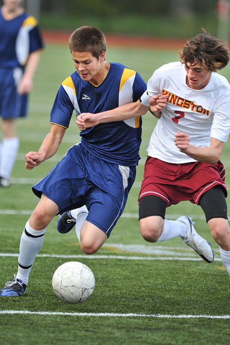 BHS' Chandler Foster battles with Kingston's Chad Trask.