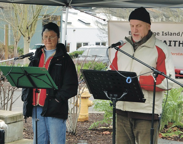 Connie Walton and the Reverend Jaco ten Hove read aloud from the Universal Declaration of Human Rights.