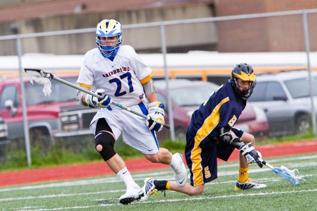 Bainbridge defender Nick Lacy picks up a ground ball against Bellevue Wednesday. The Spartans have reached the semifinals twice since winning the state title in 2007.