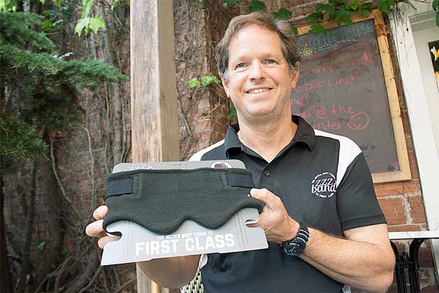 Bainbridge Island resident Don Linrothe shows off the first product he created for his new company