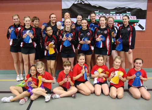 The Bainbridge Island Rope Skippers pose with its medals and ribbons after the Regional tournament at Woodward Middle School. (Back row L-R): Kelsey Gonwick