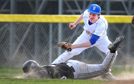 BHS' Nick Denny tries to tag out Franklin's Justin Wong Tuesday.