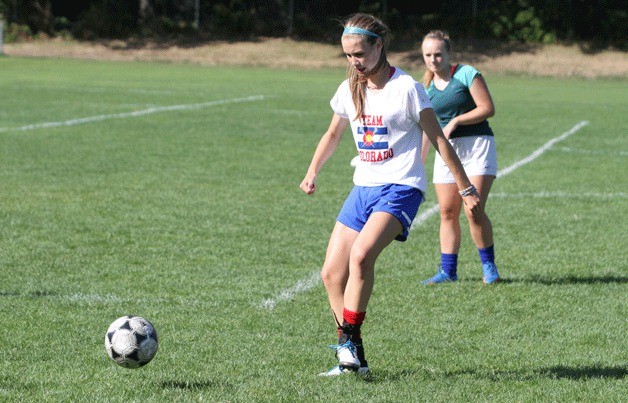 Members of the Spartans girls soccer team practice this week.