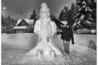 Snowed in?  The neighbors of Honeysuckle Lane got together to create an elaborate representation of Santa.