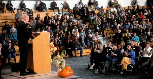 Poet Billy Collins speaks to a crowd of nearly 700 people at the Bainbridge High School gym.