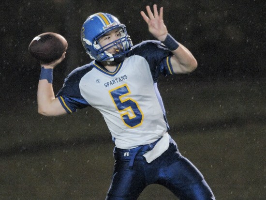 Bainbridge quarterback Chris Bell throws the ball during Friday’s game at Bellevue.