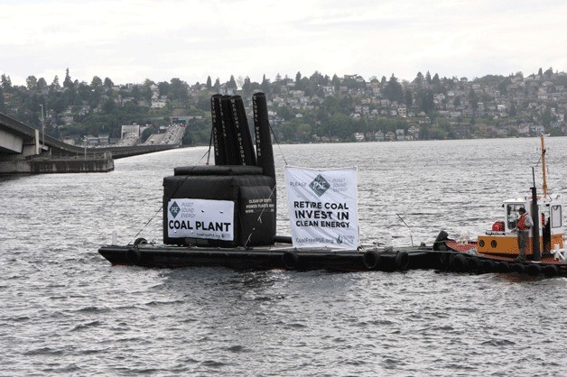 Seventeen members of Coal-Free Bainbridge took part in a demonstration against Puget Sound Energy Thursday