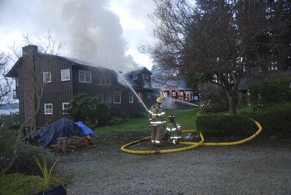 Firefighters take control of the blaze early Sunday morning.