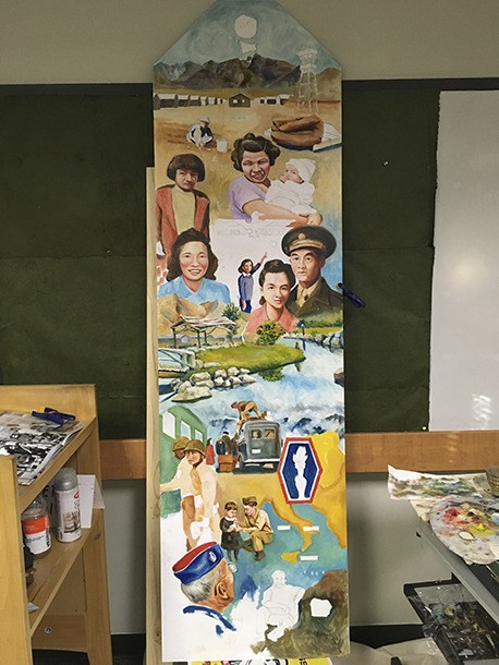 A 7-foot-2 large identification tag on which artist Chris Demarest is painting a narrative mural depicting the Japanese American experience in the tumultuous years between Pearl Harbor and the end of World War II. As part of his residency with Kitsap Regional Library