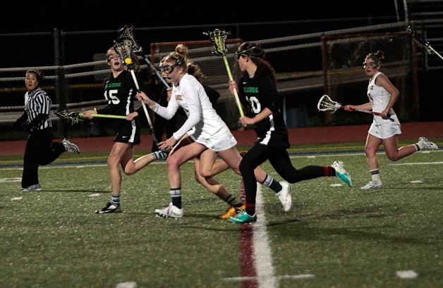 The Bainbridge High School varsity girls lacrosse team faced off against visitors from Issaquah Wednesday