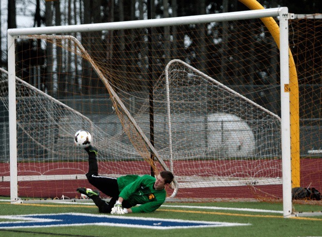 Spartan goalie Devin Reynolds makes a critical save during an O’Dea penalty shot Tuesday