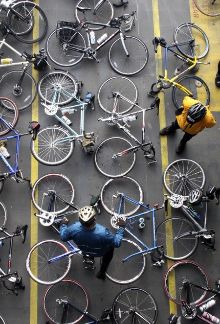 Bikes create a graphic pattern on the floor of the ferry