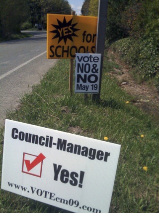 Political signs for and against both issues have popped up around the island.