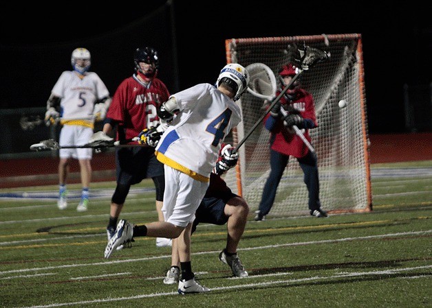 Spartan offensive effort leader Max Wickline leaps for the ball during the BHS game against Nathan Hale.