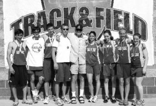 The Bainbridge boys and girls 4x400 relay team pose with their medals at Star Track in Pasco. (L-R) Stephen Vassiliadis