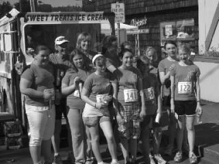 The Go Run team poses after finishing the Viking Fest 1 mile run. Go Run