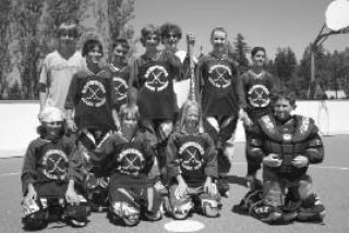 (Top): The Bainbridge Island Roller Hockey League concluded its 10th season July 26th as several teams came away from Battle Point Park with medals.  (Above Left): The Division I Lightning pose for a team photo after their title win. Front row: Jack Rector and Maya Burke-Weiner