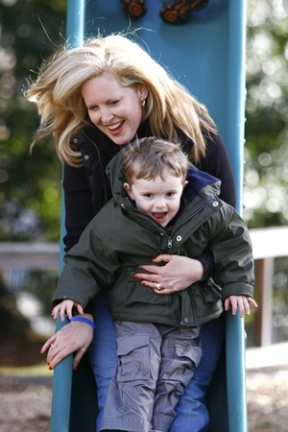 Carie Bude slides with her son