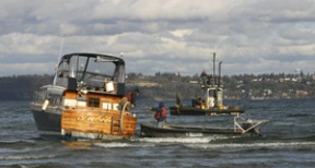 A crew from Global Diving and Salvage of Seattle works to free the Jubilee