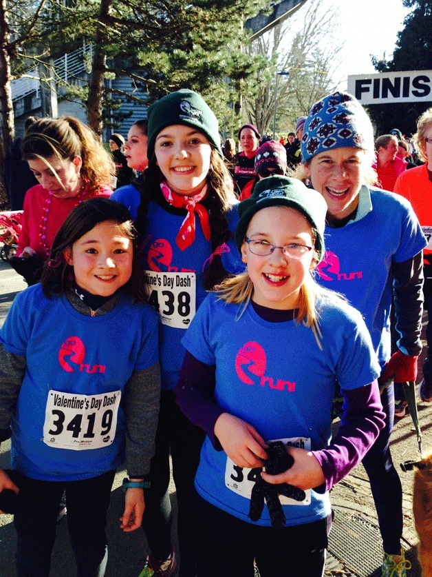 Bainbridge runners are all smiles at the finish line of the recent Go Run! “Love ’Em or Leave ’Em” 5K event.