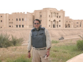 Journalist Chris Kline at Saddam Hussein’s palace in Hussein’s hometown of Tikrit. Iraq. The veteran war correspondent will next travel to war-torn Darfur to try to tell an eyewitness story.