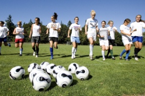 Members of the Bainbridge girls soccer team warm up at practice Thursday.